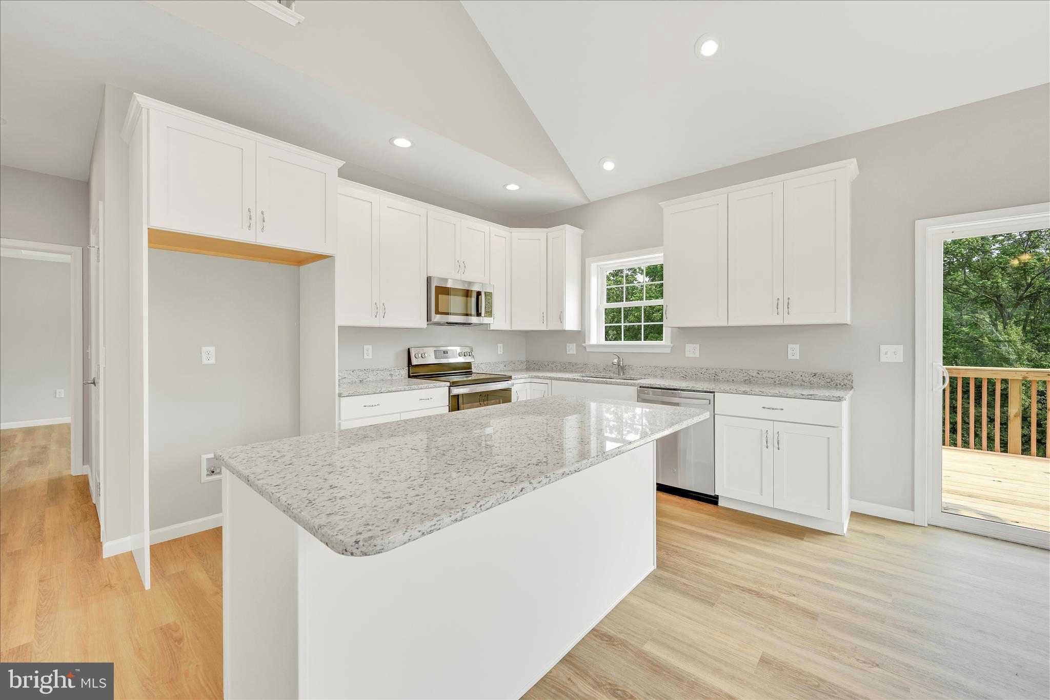 227 Pilgrim Drive Lancaster, PA 17603 - Photo 6 of 24 a kitchen with stainless steel appliances granite countertop a sink stove and refrigerator