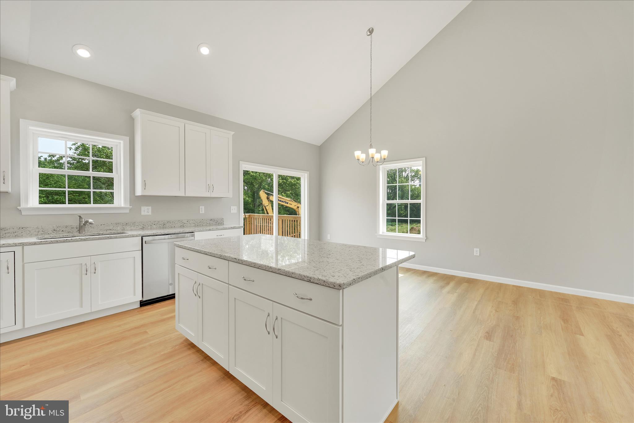 227 Pilgrim Drive Lancaster, PA 17603 - Photo 8 of 24 a kitchen with granite countertop white cabinets and a window