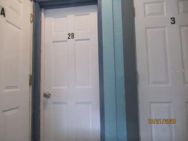 a view of a hallway with closet