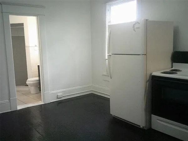 a view of small space with wooden floor