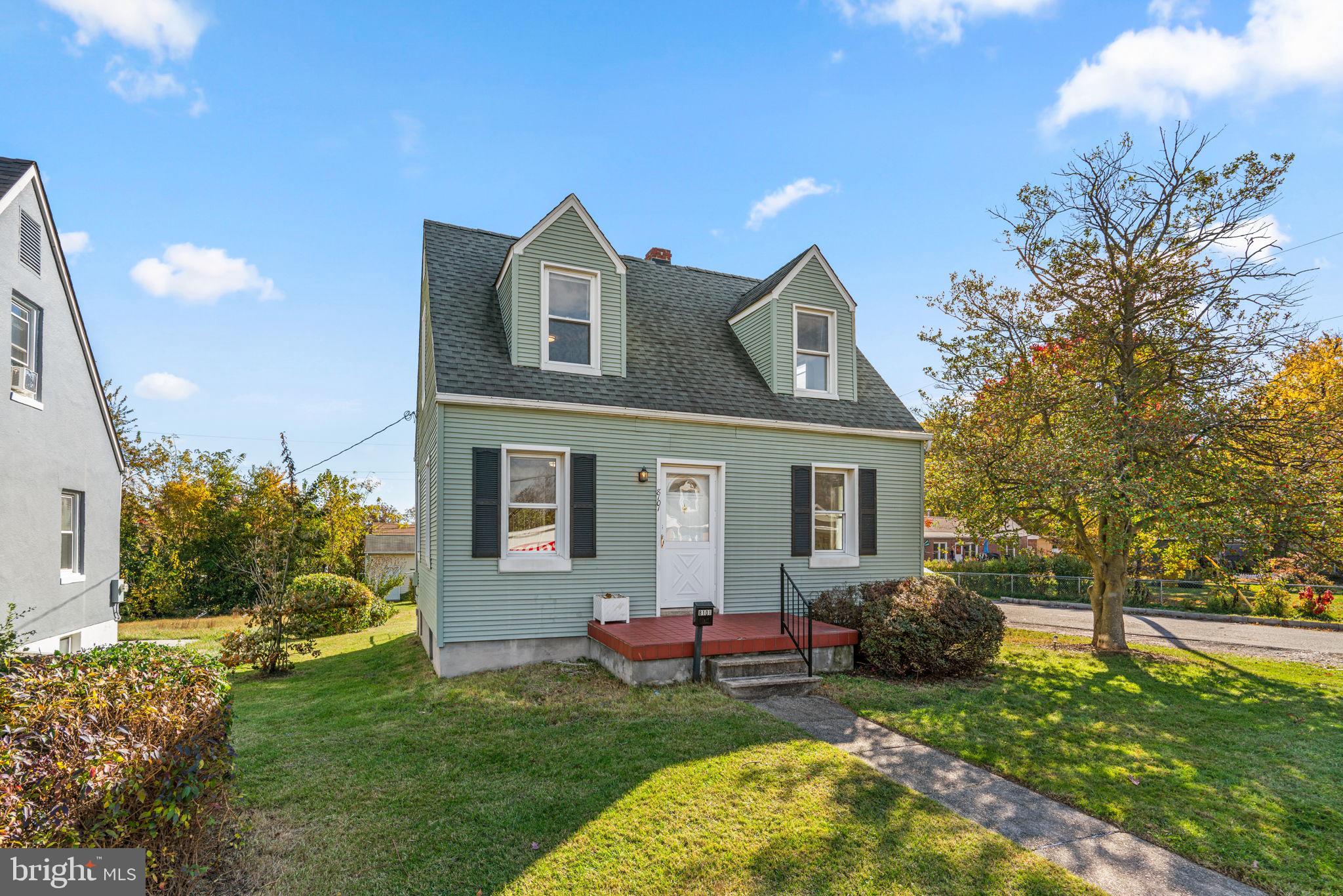 8101 Hillendale Road Baltimore, MD 21234 - Photo 2 of 27 a view of a house with a backyard