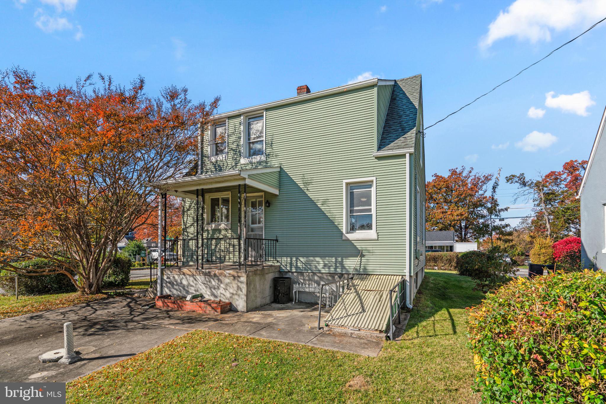 8101 Hillendale Road Baltimore, MD 21234 - Photo 24 of 27 a view of a house with backyard sitting area and garden