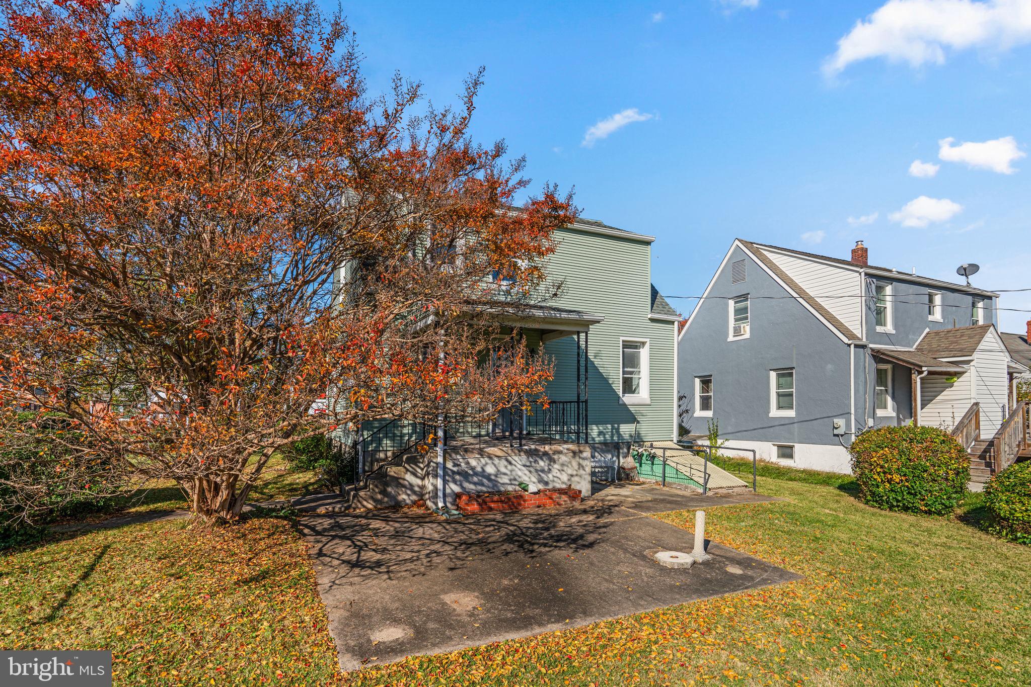 8101 Hillendale Road Baltimore, MD 21234 - Photo 25 of 27 a front view of a house with garden