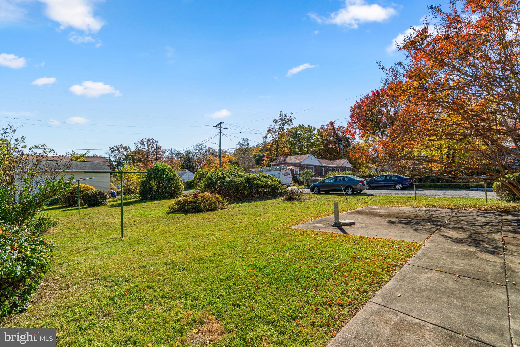 8101 Hillendale Road Baltimore, MD 21234 - Photo 26 of 27 a view of a swimming pool with an outdoor seating and a garden