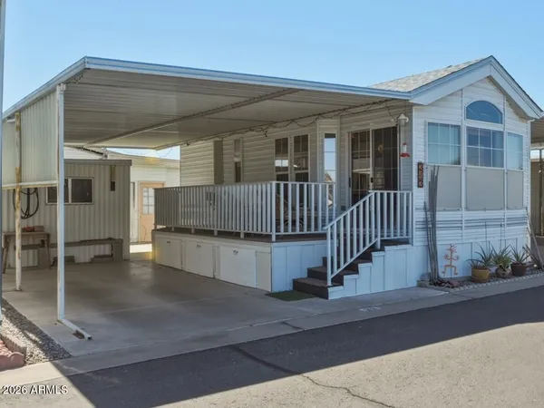 a view of a house with a porch