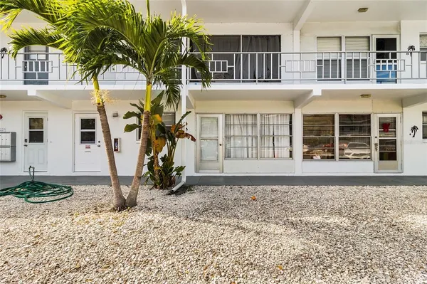 a house view with a outdoor space