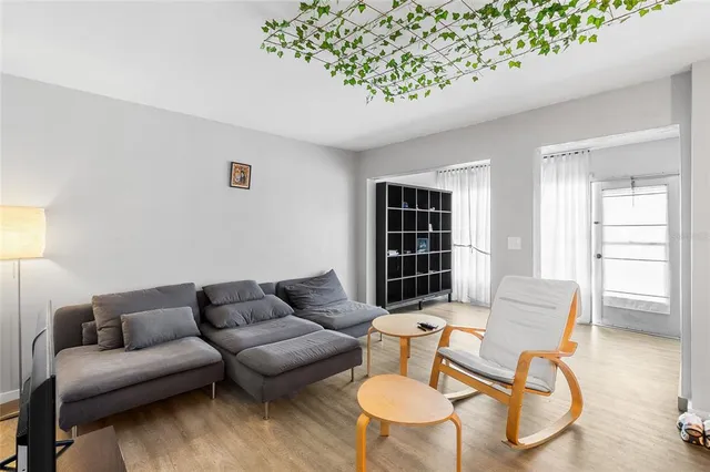 a living room with furniture and window