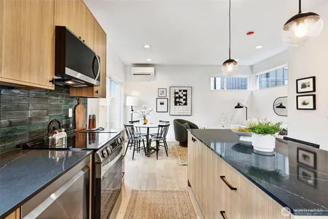 a kitchen with granite countertop lots of counter top space