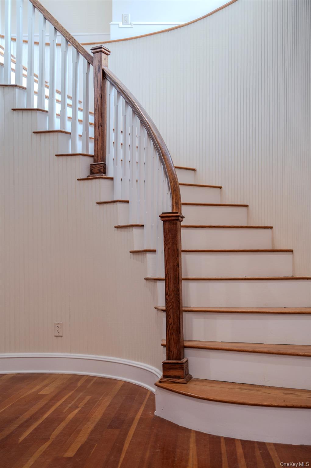 54 East Lake Stable Road Tuxedo Park, NY 10987 - Photo 19 of 31 Stairs with wood-type flooring