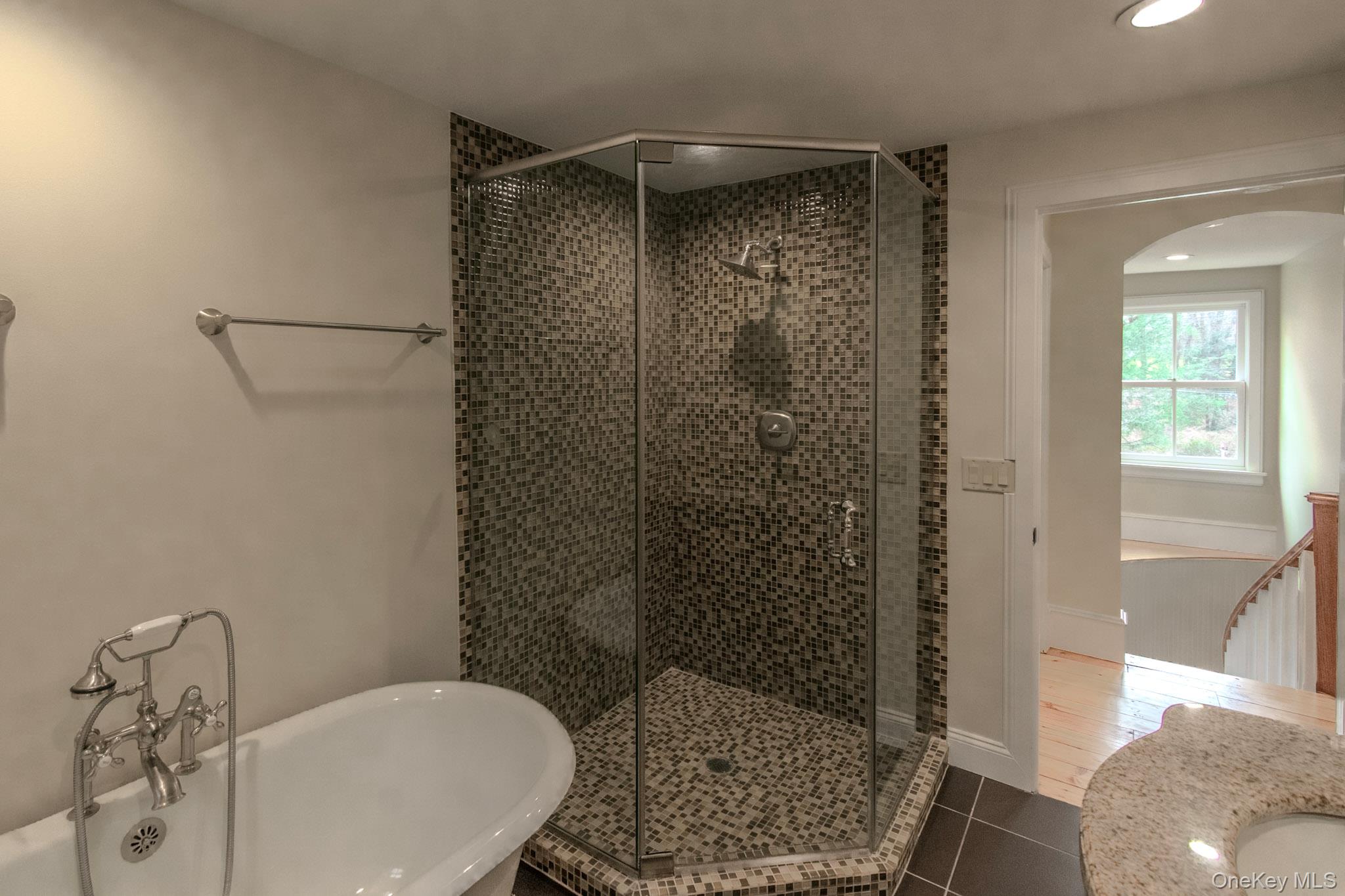 54 East Lake Stable Road Tuxedo Park, NY 10987 - Photo 25 of 31 Bathroom featuring tile patterned floors and shower with separate bathtub