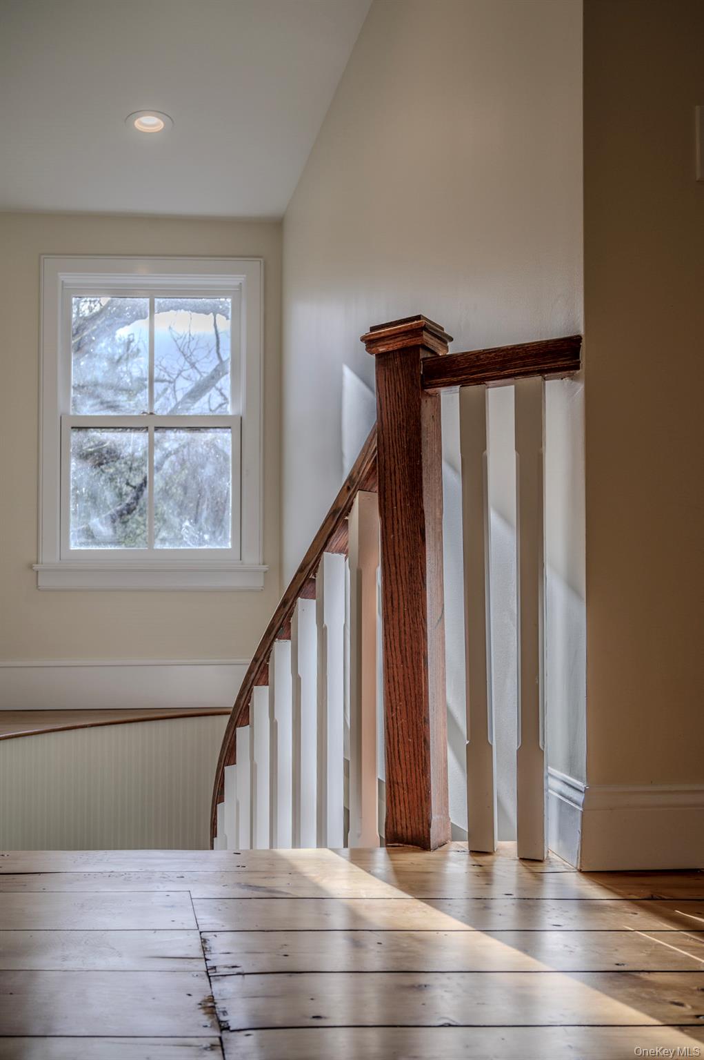 54 East Lake Stable Road Tuxedo Park, NY 10987 - Photo 28 of 31 Stairs featuring hardwood / wood-style floors and vaulted ceiling