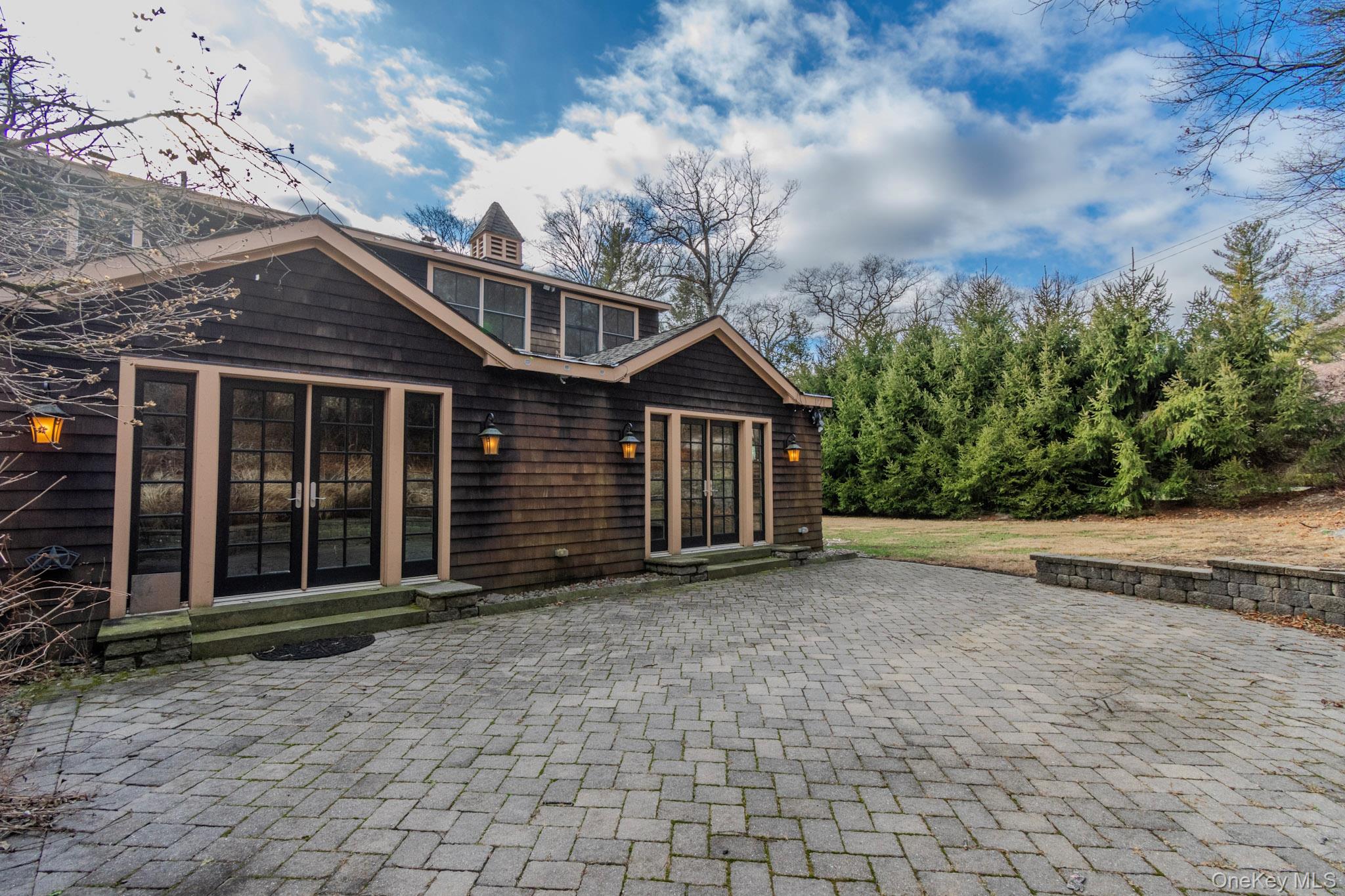 54 East Lake Stable Road Tuxedo Park, NY 10987 - Photo 29 of 31 Back of house featuring a patio