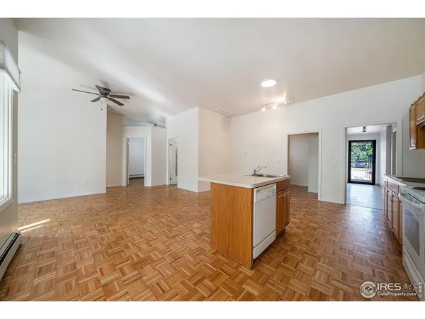 a view of a kitchen with a sink