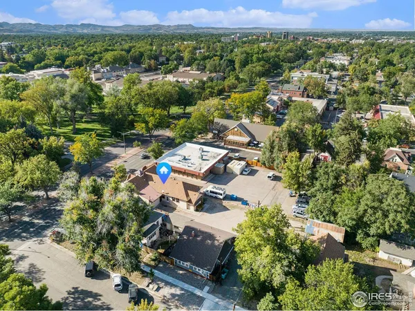 an aerial view of a city with lots of residential buildings