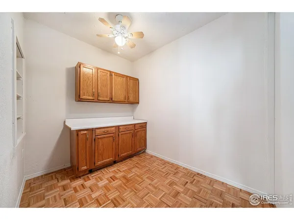 a bathroom with a sink vanity and a mirror