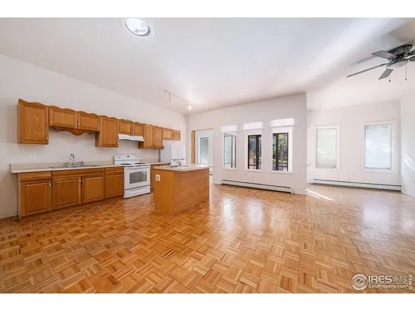 a view of a kitchen with a sink
