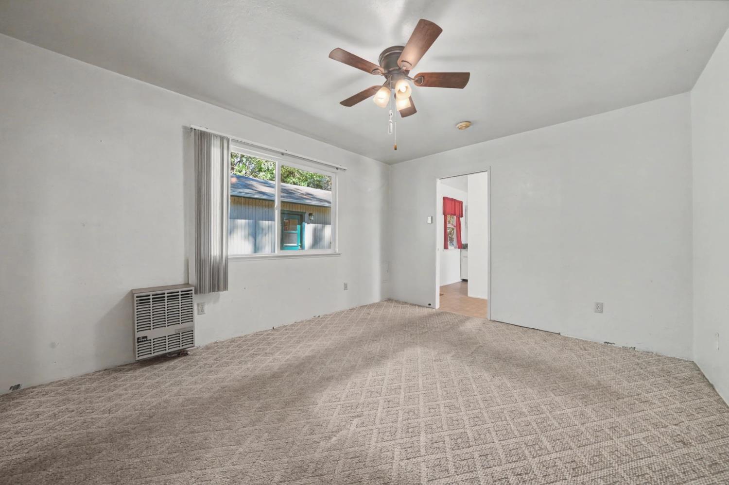 14371 Tobacco Road Pine Grove, CA 95665 - Photo 15 of 38 a view of an empty room with a window