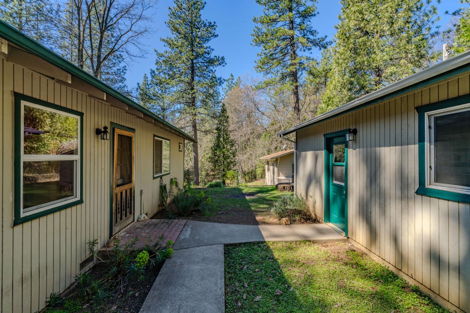 14371 Tobacco Road Pine Grove, CA 95665 - Photo 17 of 38 a view of a house with a yard