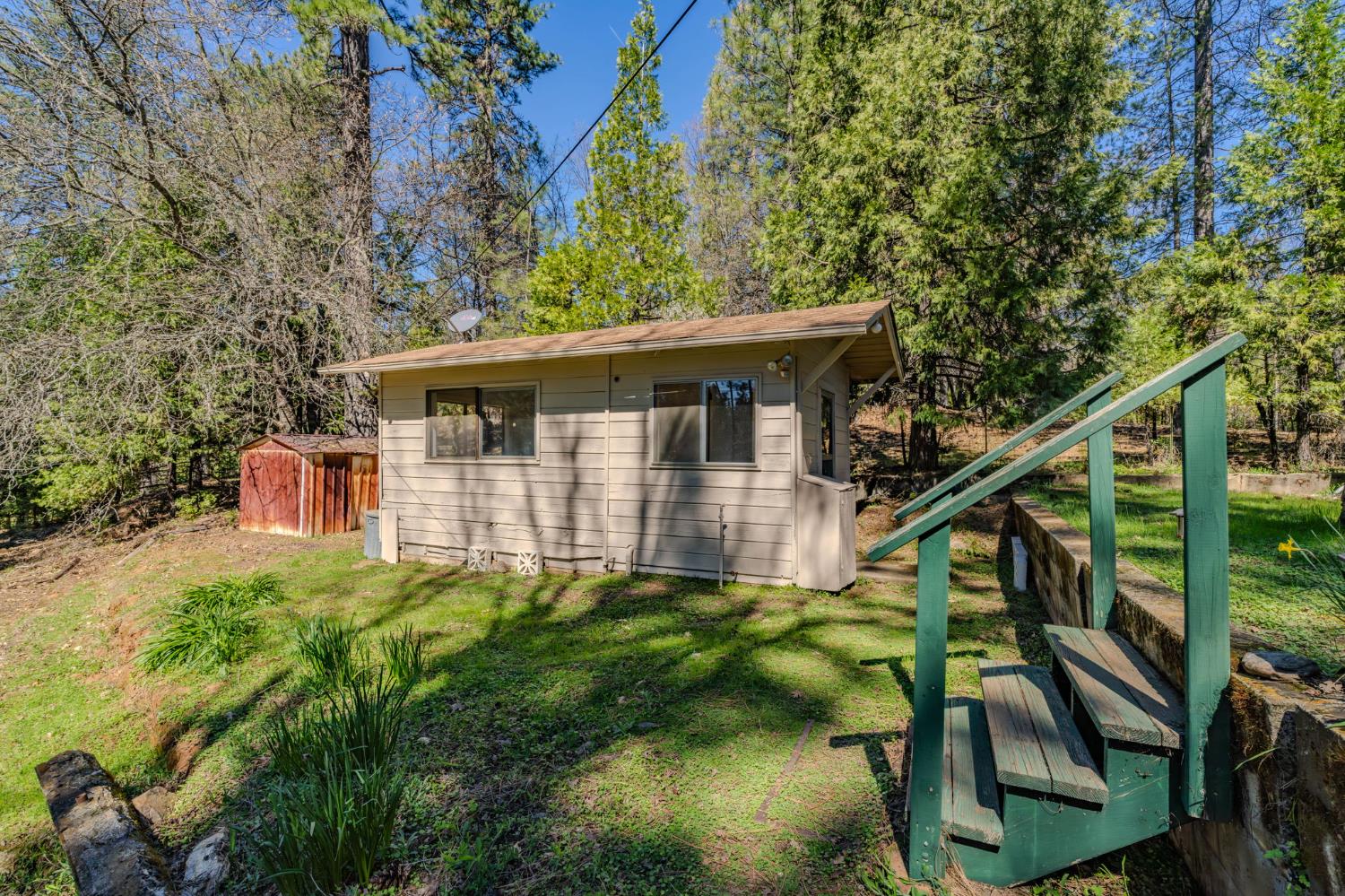 14371 Tobacco Road Pine Grove, CA 95665 - Photo 20 of 38 a backyard of a house with seating space