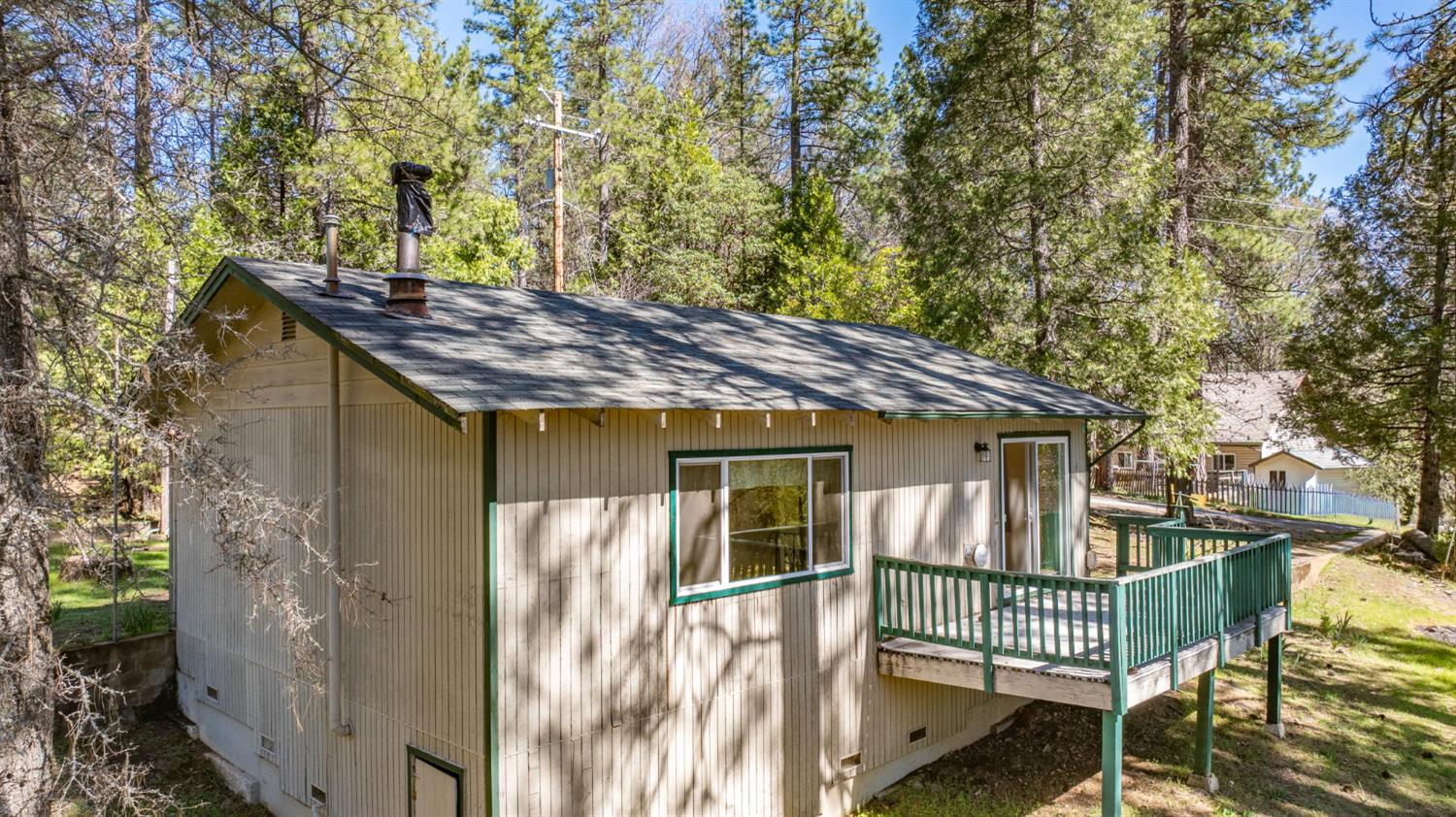 14371 Tobacco Road Pine Grove, CA 95665 - Photo 23 of 38 a view of a house with a wooden deck
