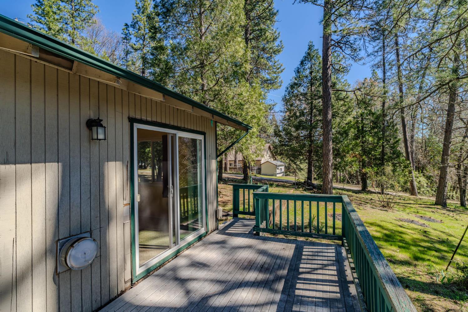 14371 Tobacco Road Pine Grove, CA 95665 - Photo 25 of 38 a view of a house with backyard and balcony