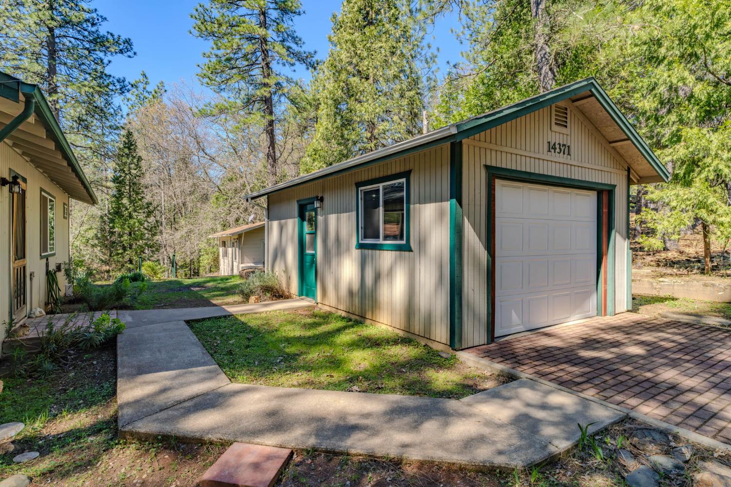 14371 Tobacco Road Pine Grove, CA 95665 - Photo 28 of 38 a front view of house with yard