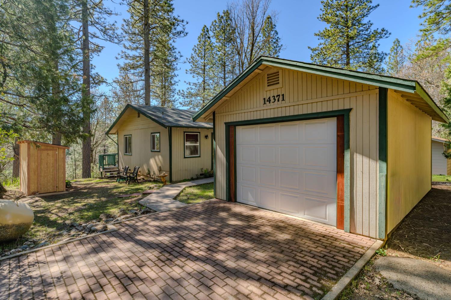 14371 Tobacco Road Pine Grove, CA 95665 - Photo 3 of 38 a front view of a house with a yard