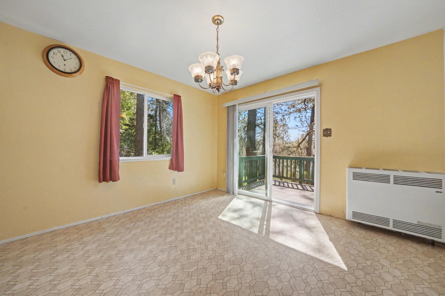 14371 Tobacco Road Pine Grove, CA 95665 - Photo 9 of 38 a view of an empty room with a window