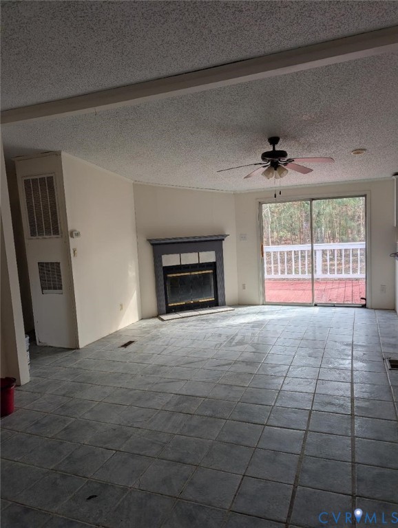 947 South Salisbury Road Hague, VA 22469 - Photo 4 of 10 a view of an empty room with a fireplace and a window