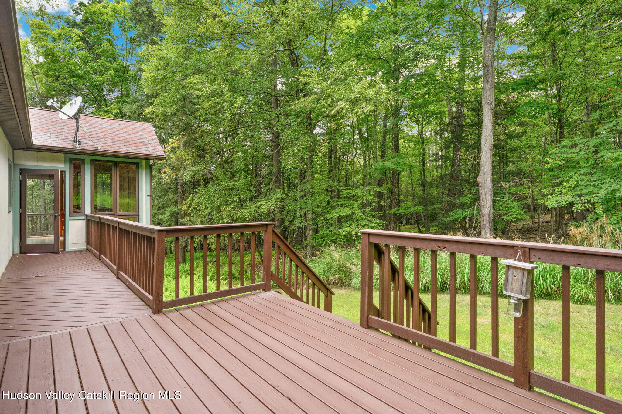 650 Beaverkill Road Olivebridge, NY 12461 - Photo 26 of 31 a view of balcony with wooden floor and fence
