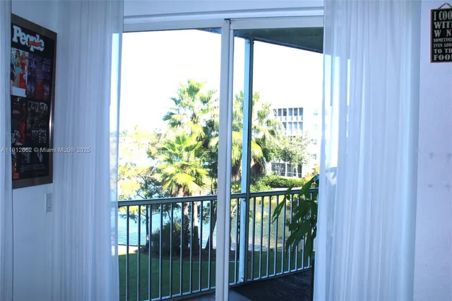 a view of balcony with furniture
