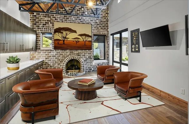 a view of a bathroom with a shower and a window