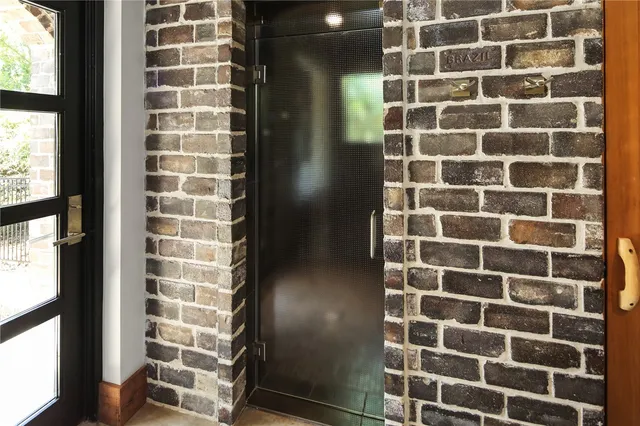 a view of a balcony with furniture