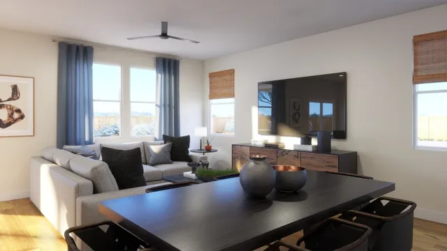 a view of a dining room with furniture and windows