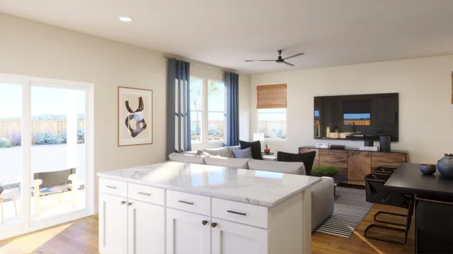 a kitchen with sink refrigerator and large window