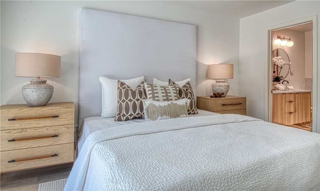 39 Seton Road Irvine, CA 92612 - Photo 12 of 28 a bedroom with a bed and night stand