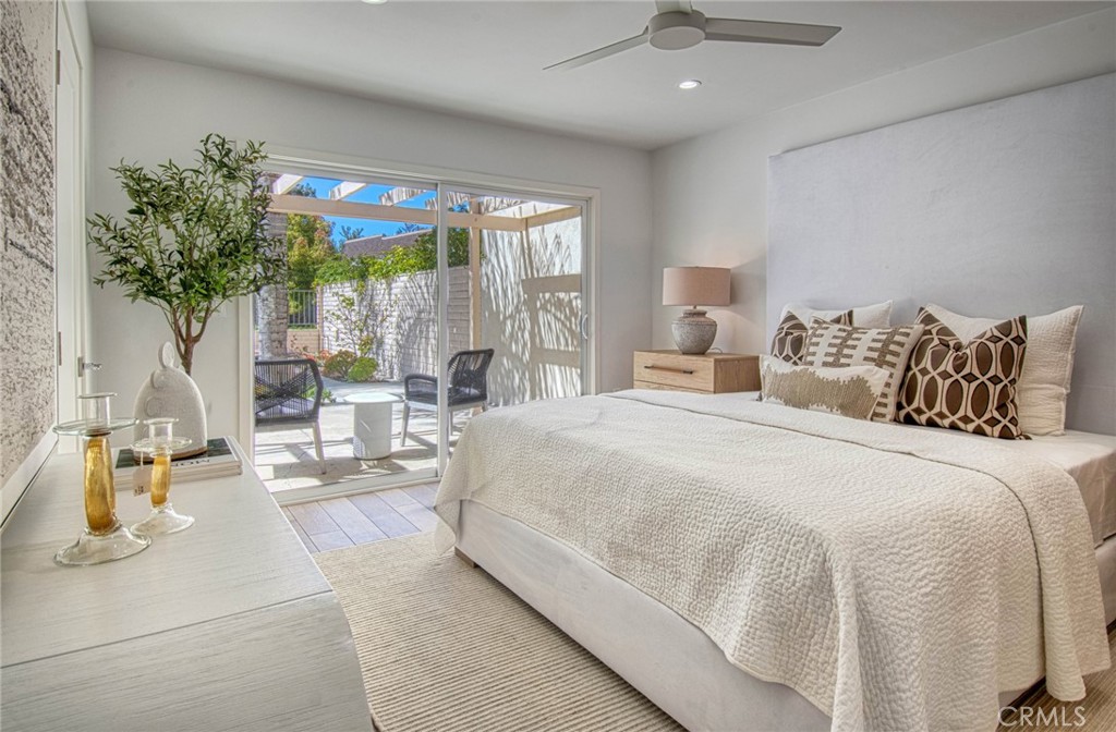 39 Seton Road Irvine, CA 92612 - Photo 13 of 28 a bedroom with a large bed and a potted plant