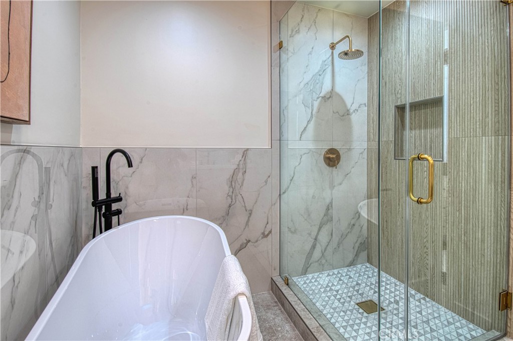 39 Seton Road Irvine, CA 92612 - Photo 17 of 28 a bathroom with a sink and shower