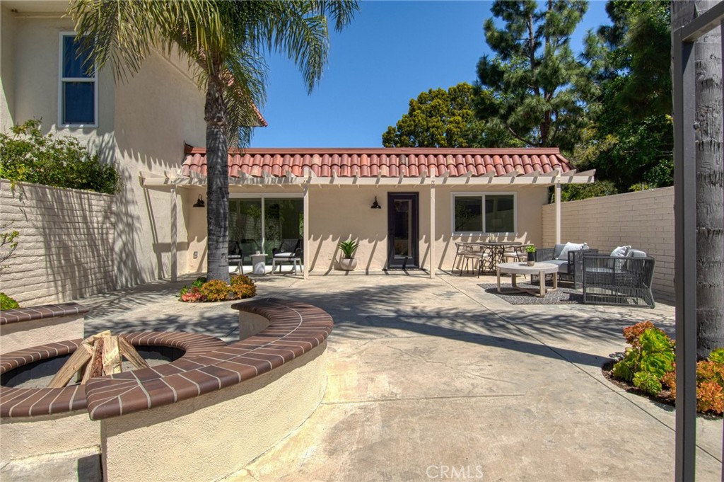 39 Seton Road Irvine, CA 92612 - Photo 18 of 28 a view of a dinning room with furniture and palm tree