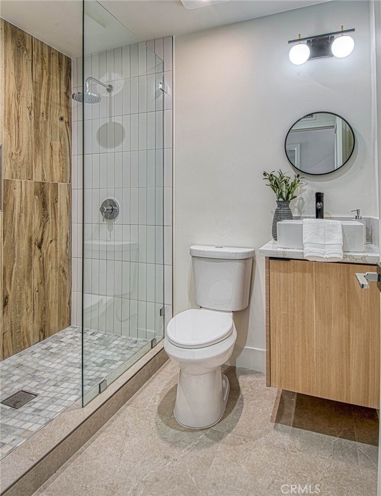 39 Seton Road Irvine, CA 92612 - Photo 21 of 28 a bathroom with a toilet a sink and shower