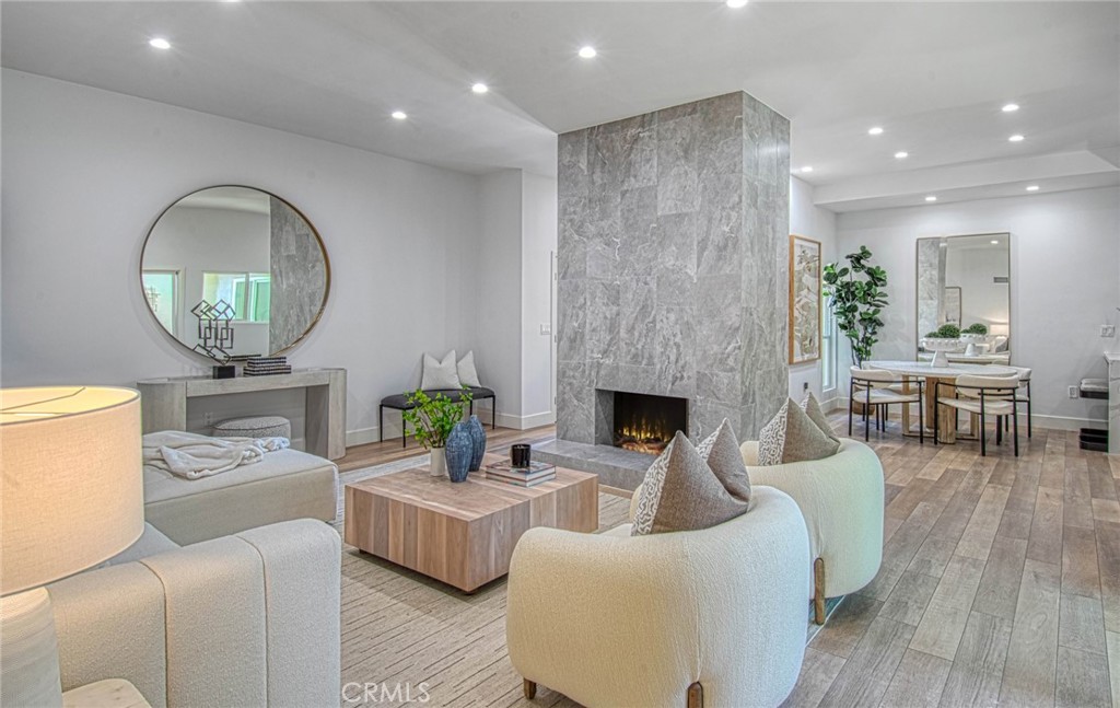 39 Seton Road Irvine, CA 92612 - Photo 3 of 28 a living room with furniture and a wooden floor