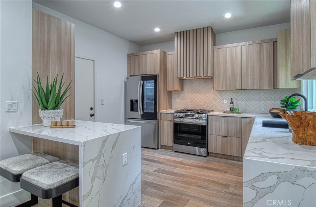 39 Seton Road Irvine, CA 92612 - Photo 4 of 28 a kitchen with a table and chairs in it