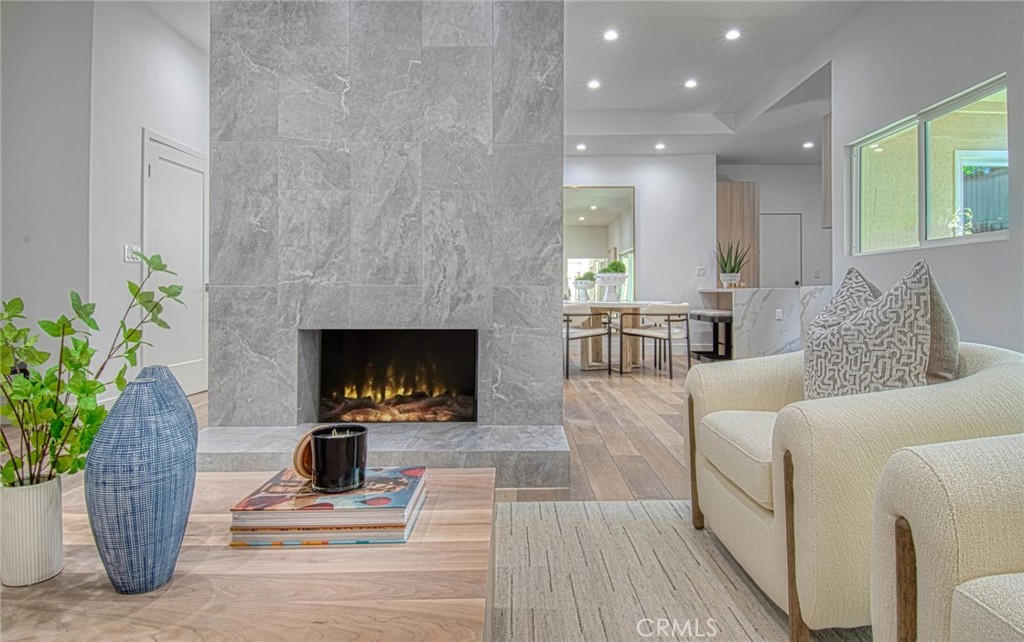 39 Seton Road Irvine, CA 92612 - Photo 5 of 28 a living room with furniture and a fireplace