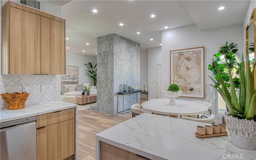 39 Seton Road Irvine, CA 92612 - Photo 9 of 28 a kitchen with sink refrigerator and microwave