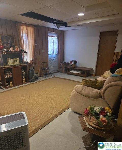 1107 Hampstead Court Bushkill, PA 18324 - Photo 9 of 17 a living room with furniture a window and a couch