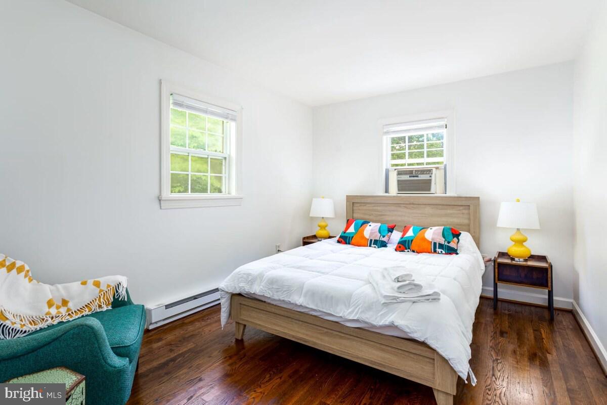 437 Joans Quadrangle Road Front Royal, VA 22630 - Photo 10 of 17 a bedroom with a bed and a table in it