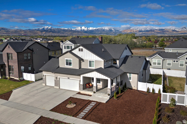 11694 Engelmann Drive Draper, UT 84020 - Photo 4 of 41 Aerial view of residential area with a mountainous background