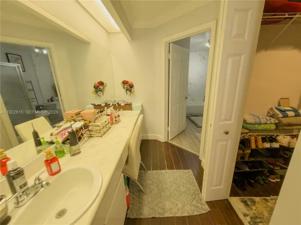 a bathroom with a shower a toilet and a shower