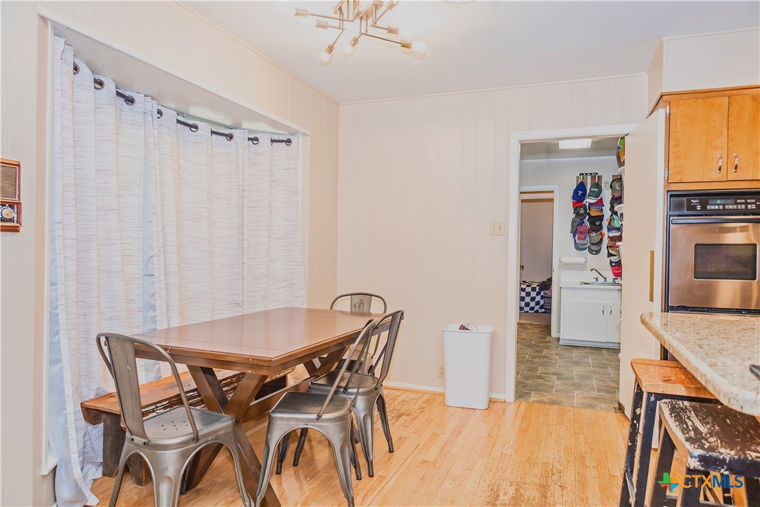 111 Dover Dell Street Victoria, TX 77904 - Photo 12 of 36 a view of a dining room with furniture and a kitchen