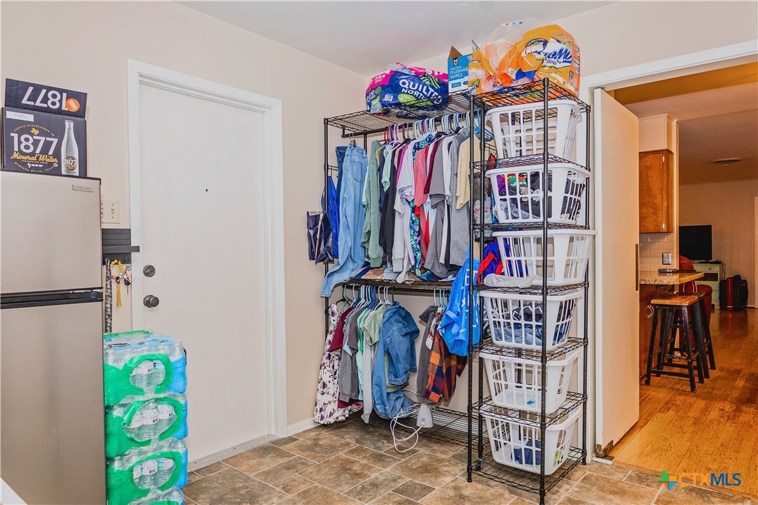 111 Dover Dell Street Victoria, TX 77904 - Photo 19 of 36 a view of a closet with storage